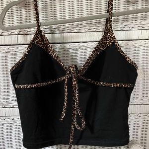 Black, cheetah lined tank top with tie in the front